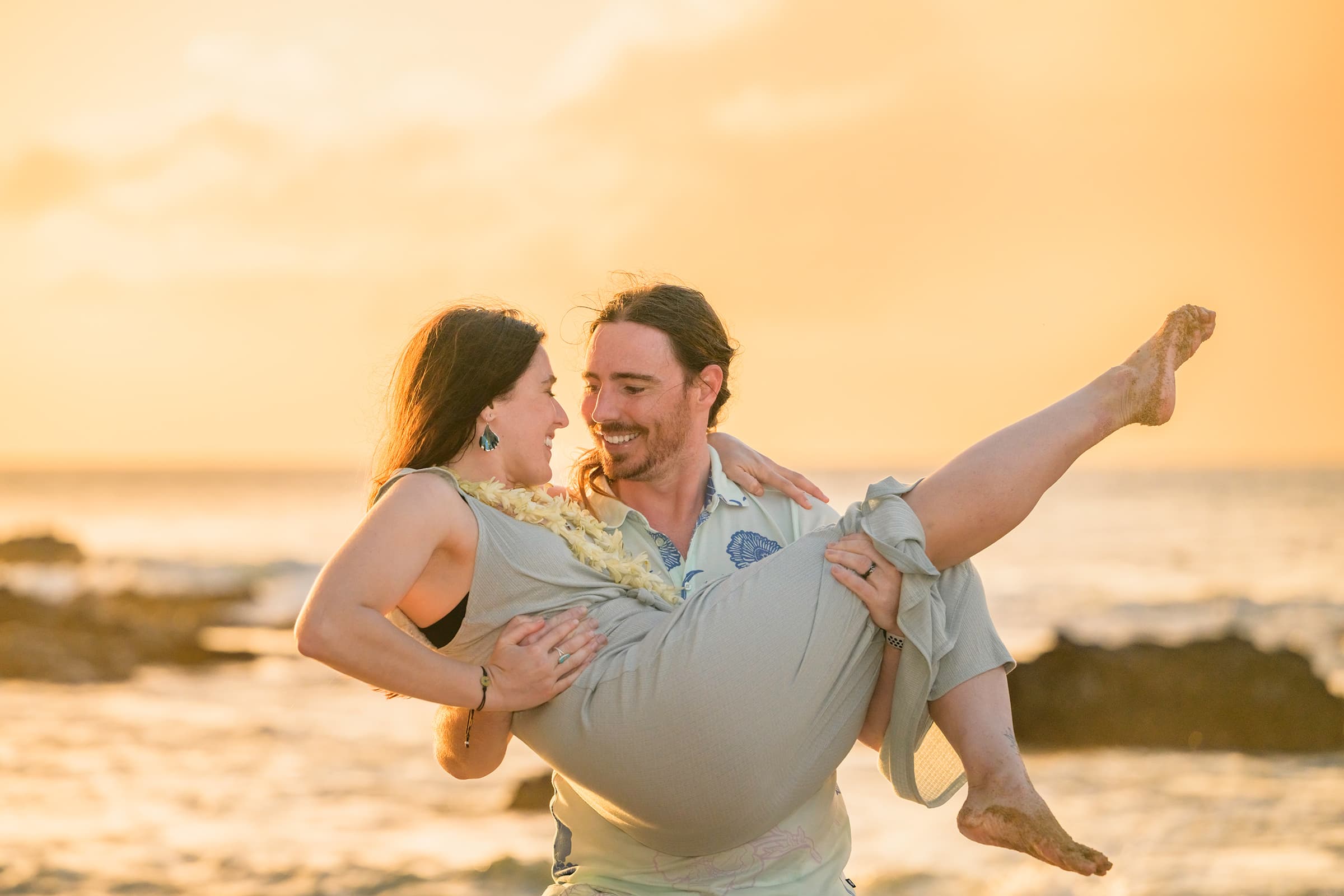 JP holds Aimee in his arms, Maui